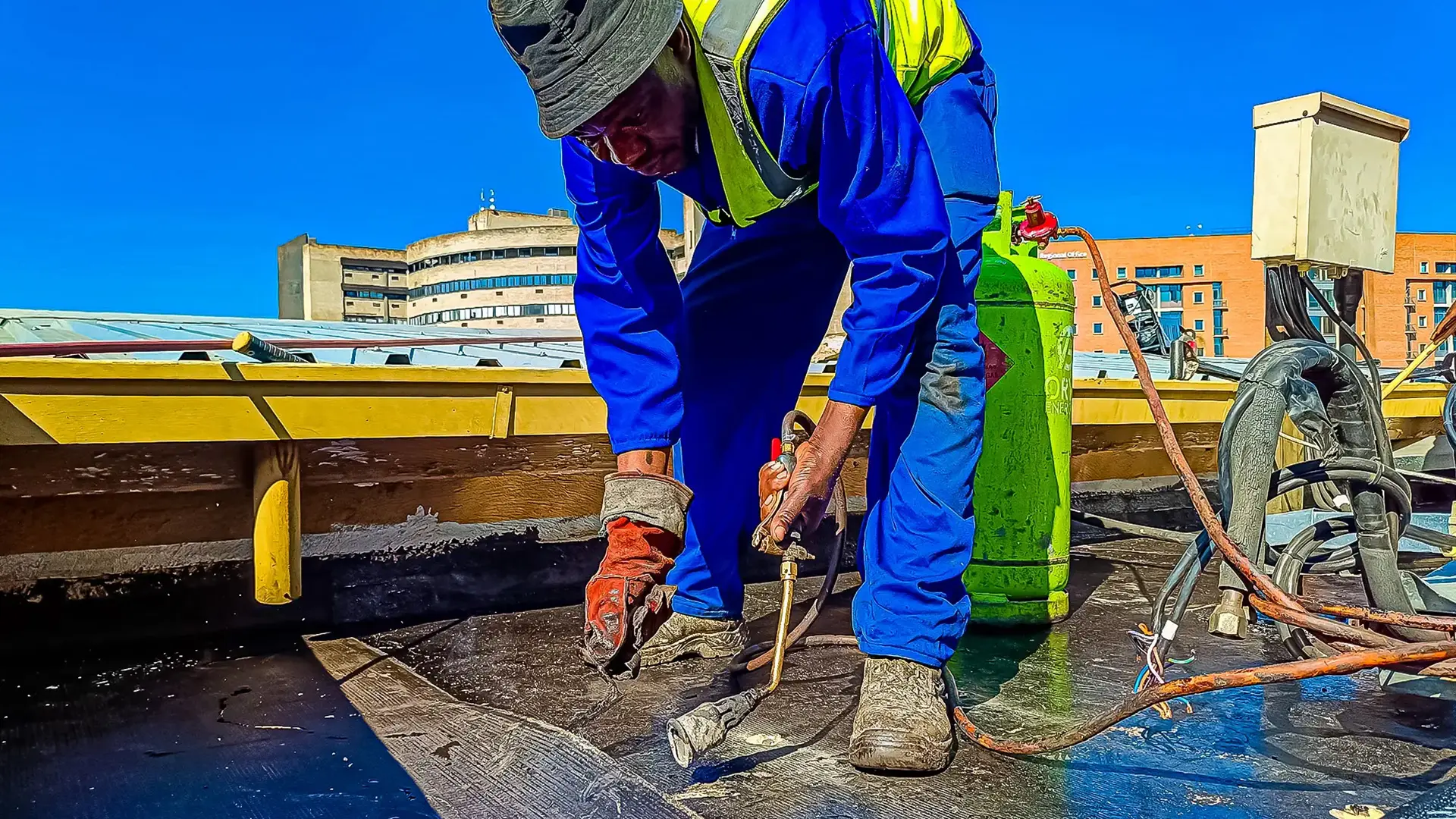 Professional torch-on waterproofing roof membrane application
